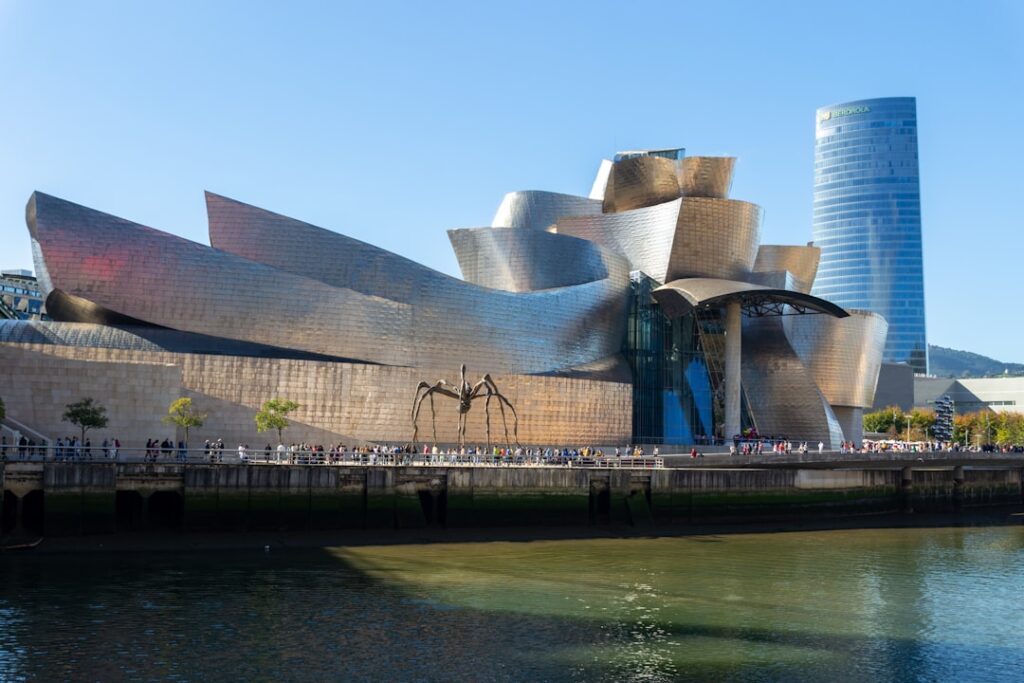 a large building that is next to a body of water